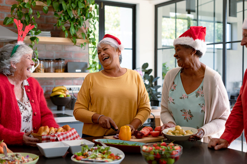 Senior women celebrating Christmas cooking